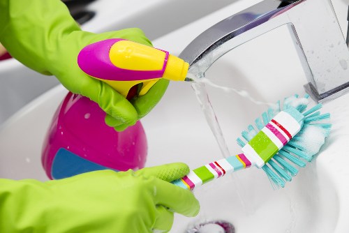 Dusting and tidying in a local Belsize Park apartment